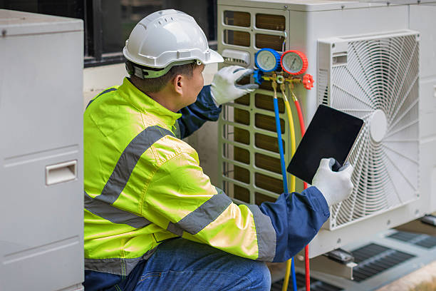 Professional Hvac technician working in Oakwood, GA